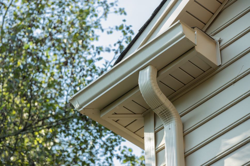 What Happens When Downspouts Are Improperly Placed in Urban Homes?