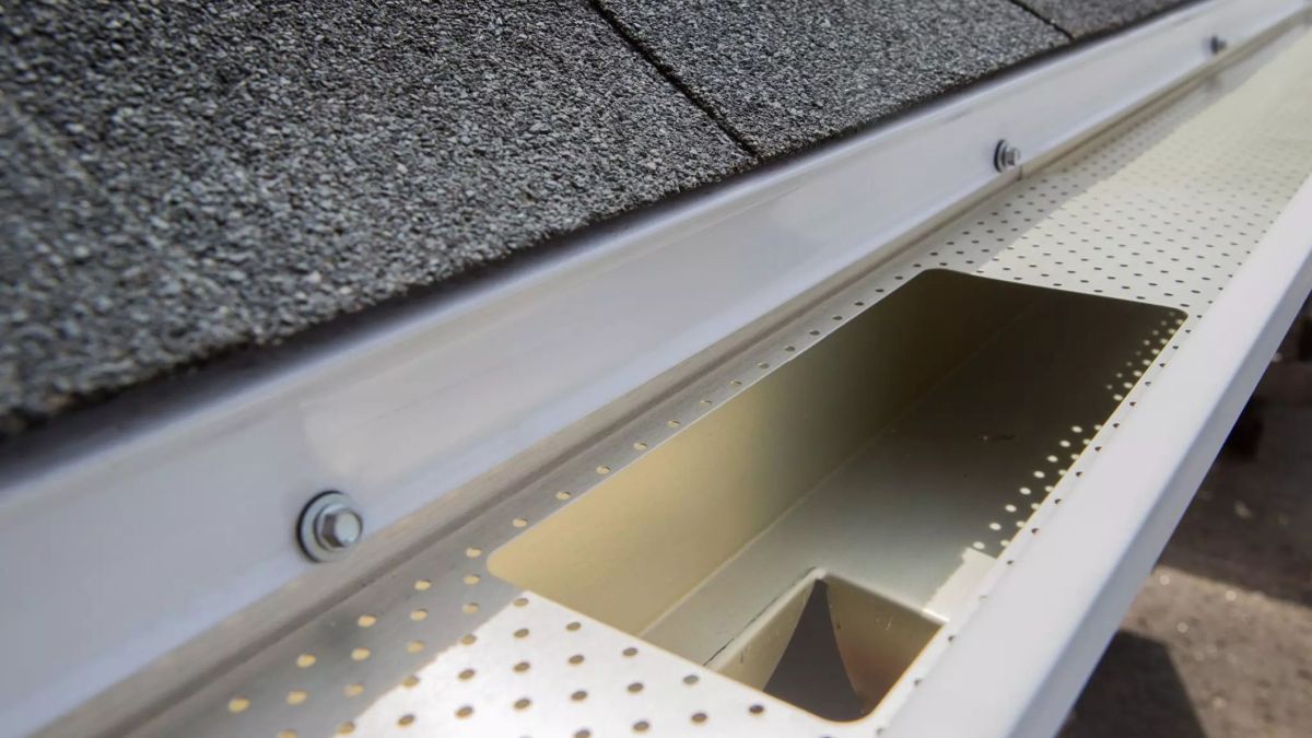 Why Is Water Running Behind My Gutters Instead of Through Them?